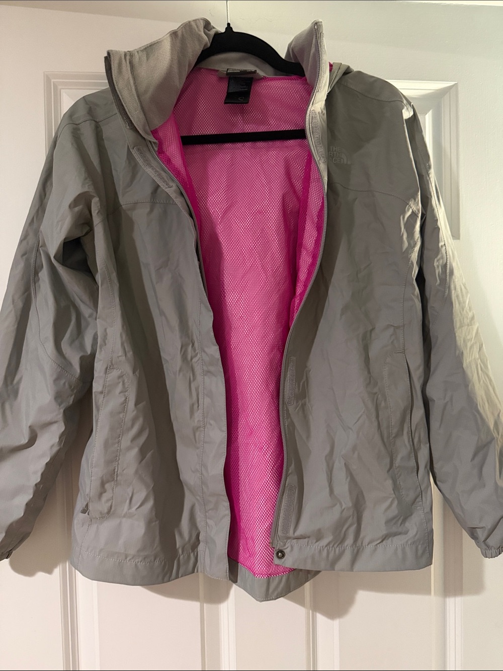 The North Face Girl’s Light Gray Rain Jacket with Pink Lining